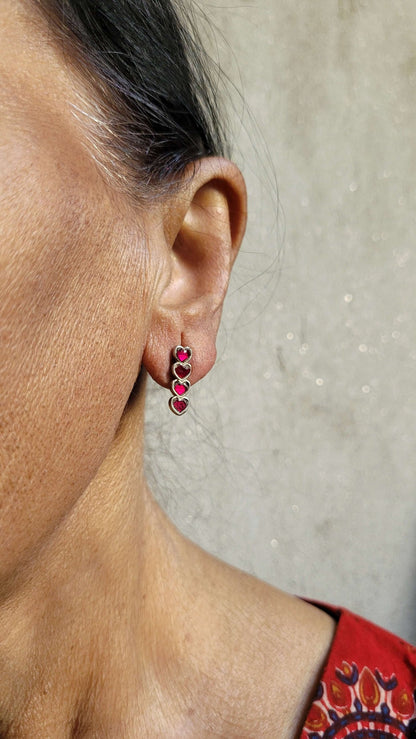 Side view of Yaarana Studs in pure silver with handcrafted detailing