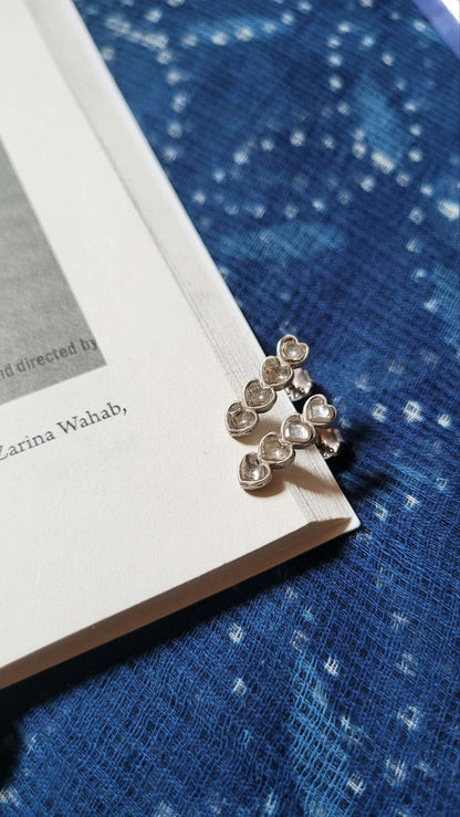 Side view of Yaarana Studs in pure silver with handcrafted detailing