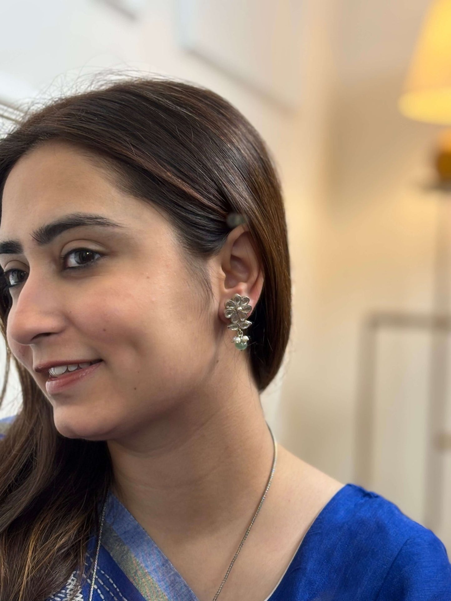 Side view of Yukti Studs in pure silver with handcrafted detailing