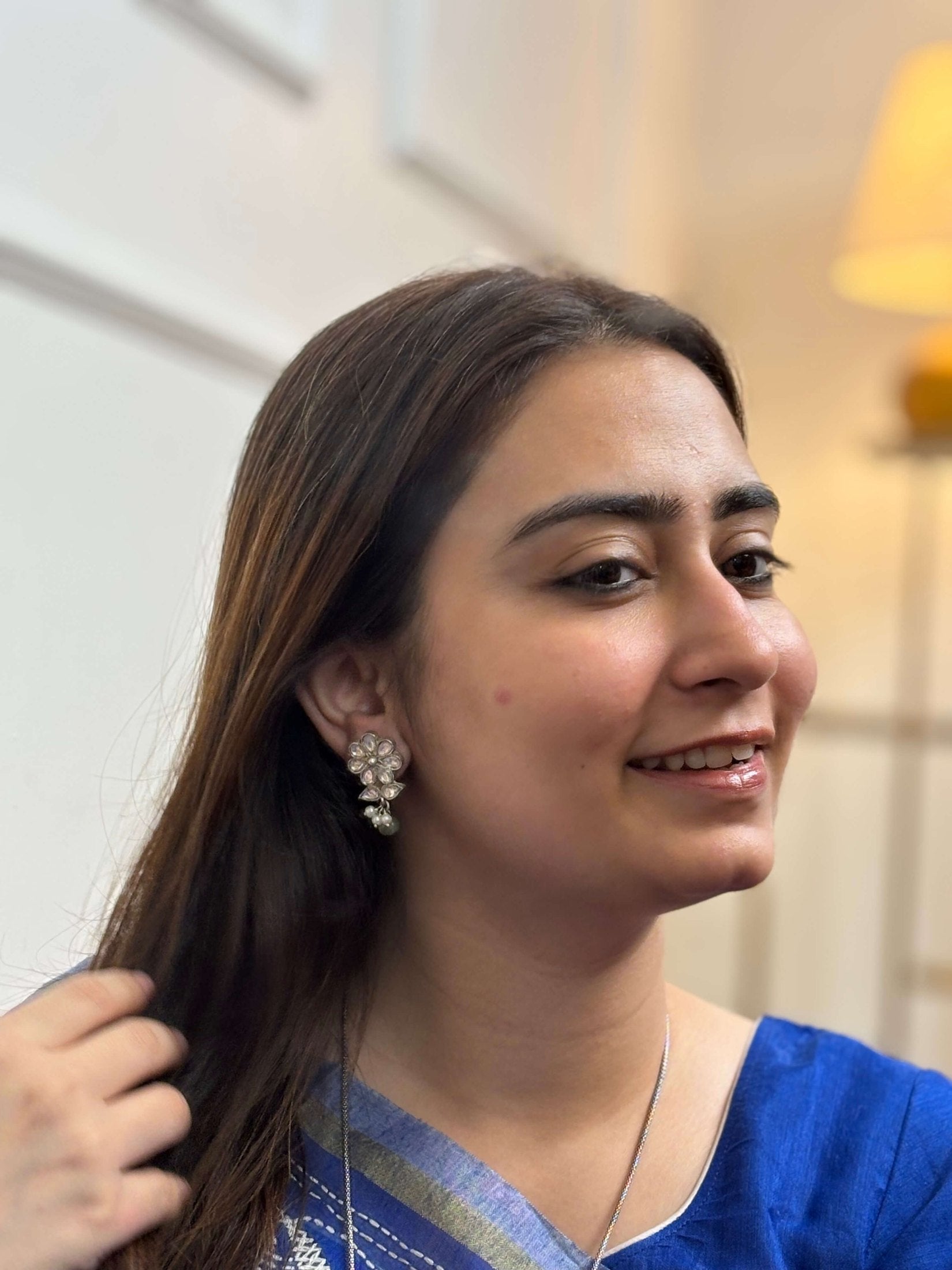 Side view of Yukti Studs in pure silver with handcrafted detailing