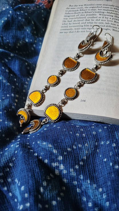 Side view of Zindagi Earrings in pure silver with handcrafted detailing
