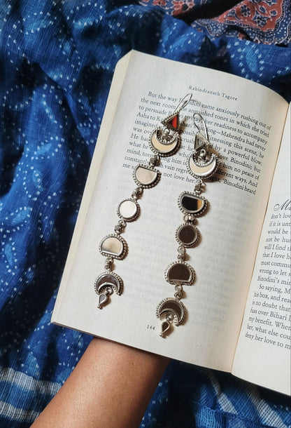 Side view of Zindagi Earrings in pure silver with handcrafted detailing