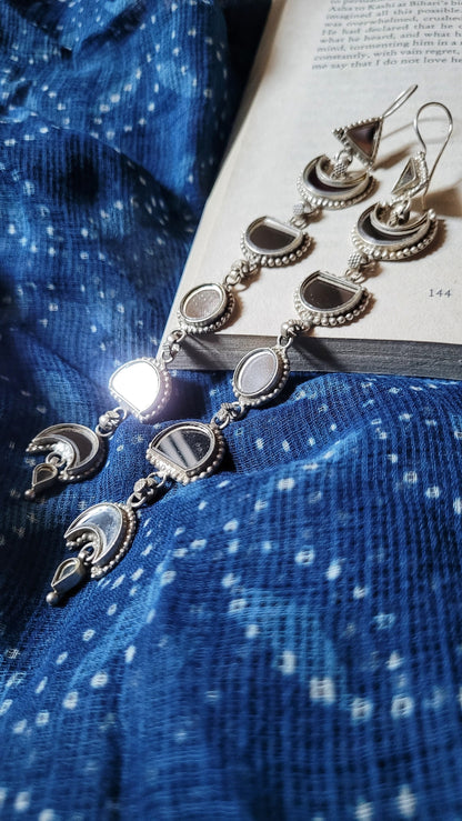 Side view of Zindagi Earrings in pure silver with handcrafted detailing