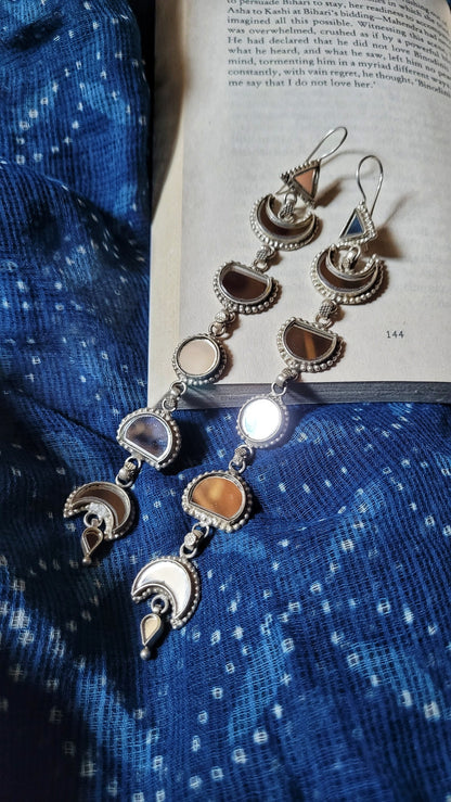 Side view of Zindagi Earrings in pure silver with handcrafted detailing