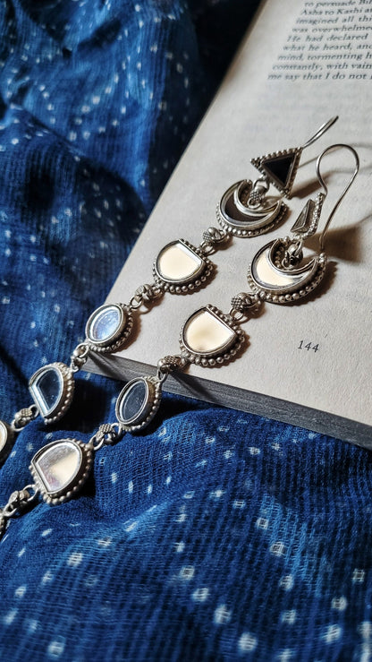 Side view of Zindagi Earrings in pure silver with handcrafted detailing