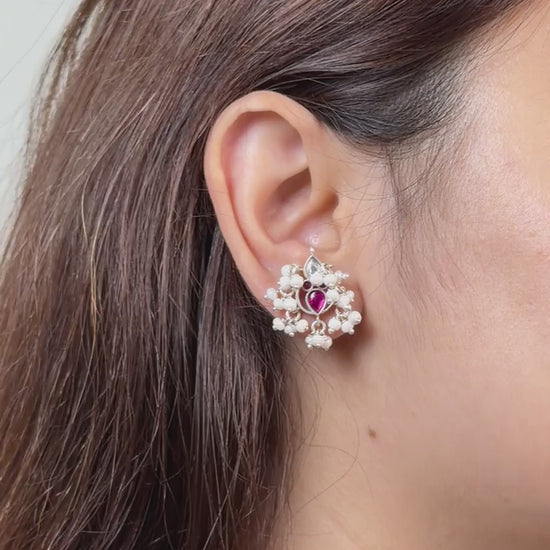 Bright polished 92.5 silver Kundan stud earrings featuring a white teardrop top, pink teardrop body, and a full cluster halo of freshwater pearls.
